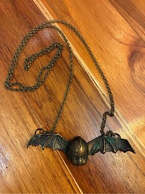 “Hypnovamp” Bronze Bat Wing Kewpie Necklace - Antique Bronze Tone